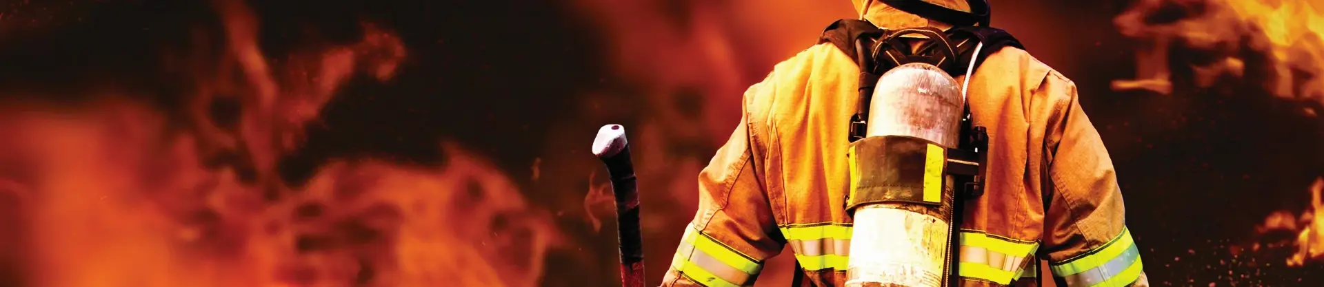 Firefighter in front of fire