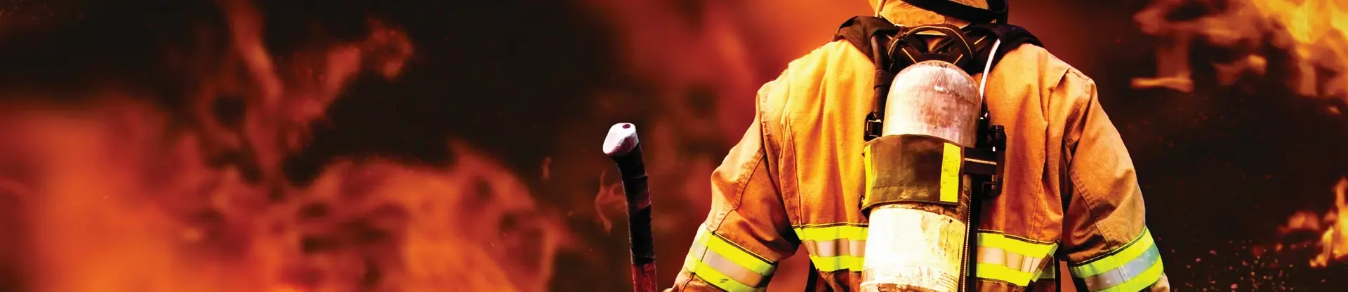 Firefighter in front of fire