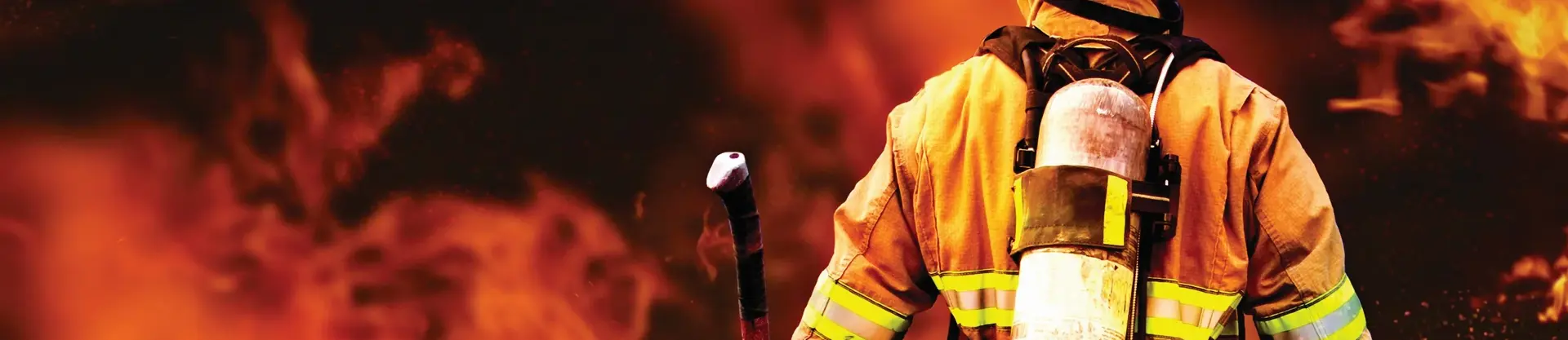 Firefighter in front of fire
