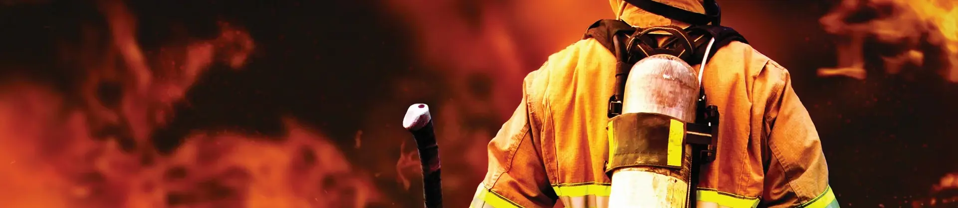 Firefighter in front of fire