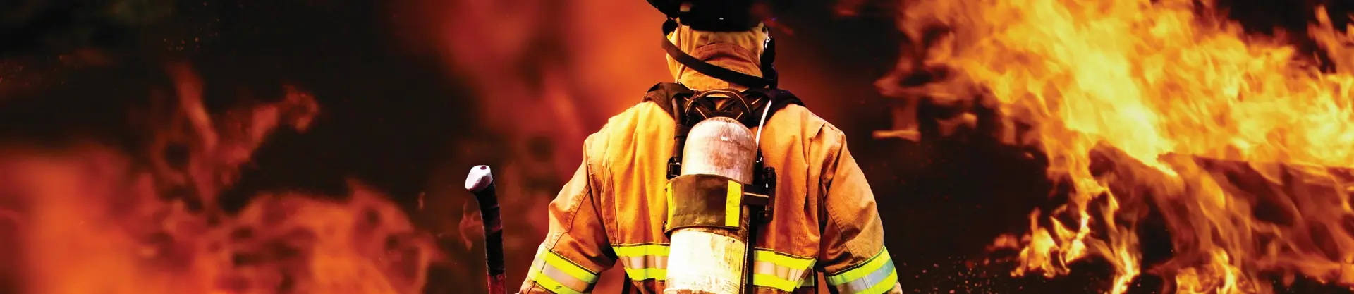 Firefighter in front of fire