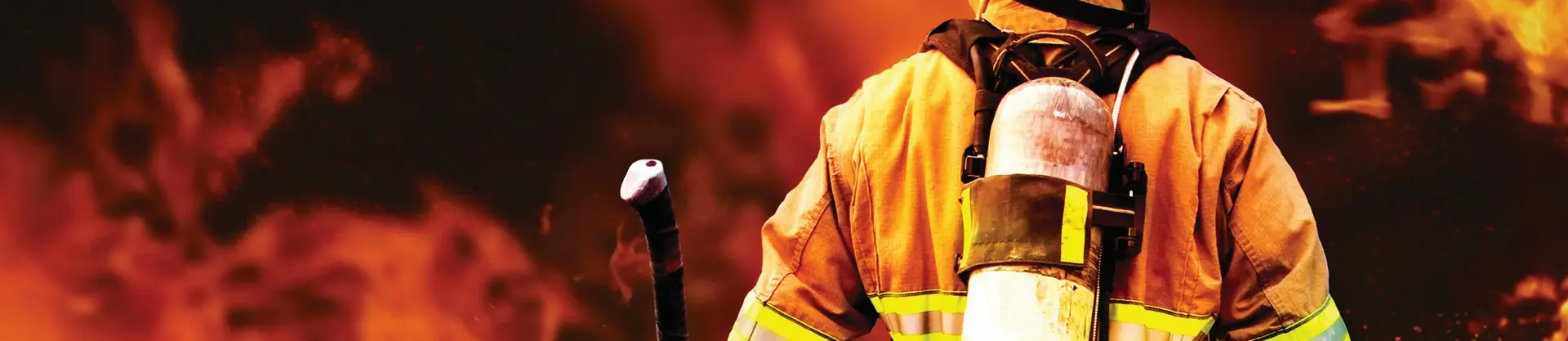 Firefighter in front of fire